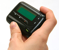 Person holding Pager Receiver